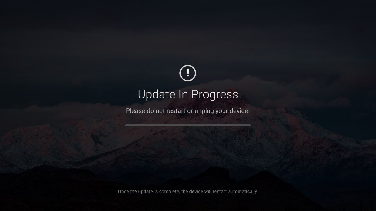 TV screen with a progress bar and the title: Update in Progress